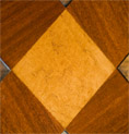 Charles Barr Four Pannel Glass Top Coffee Table in mahogany and olive wood